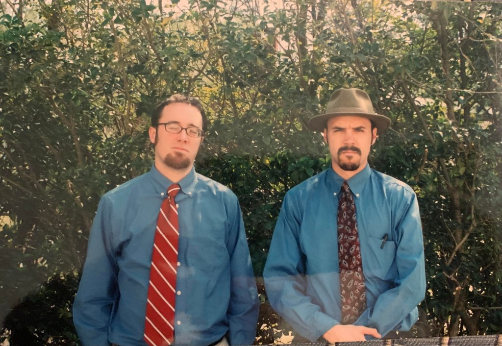 Josh and me, April 2004, at Brian Witt and Rachel Murphy's wedding. I'm the handsome devil with the well-worn fedora. He's the one squinting.